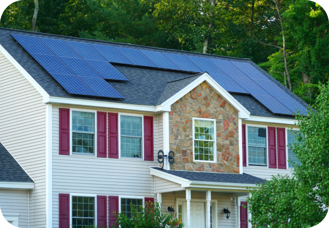 2-story house with solar panels and red shutters