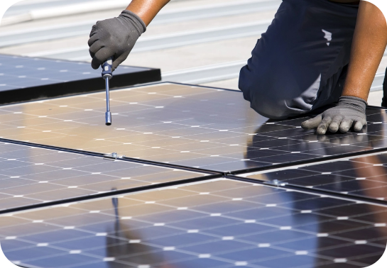 Solar technician installing solar panels